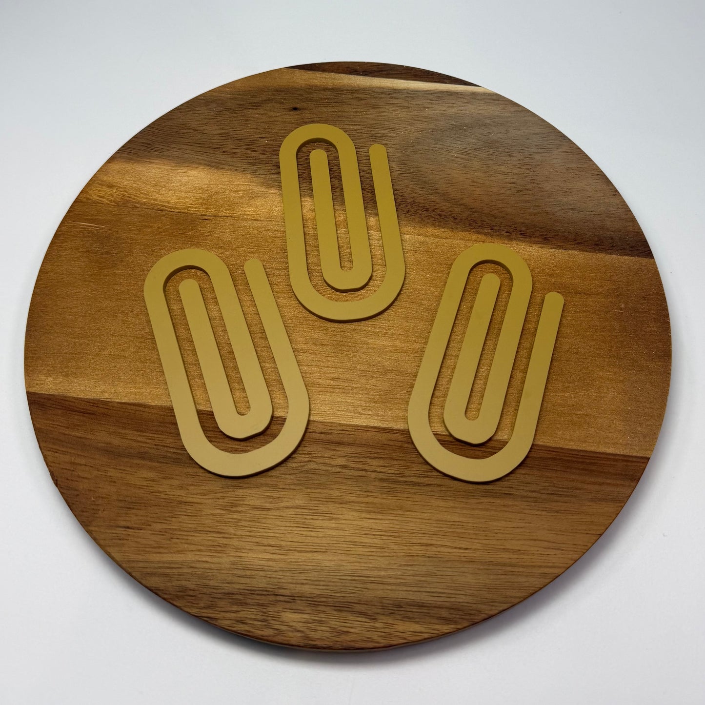 Acrylic overrsized paperclip.